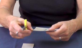 supporting-paper-with-scissor-hand.jpg