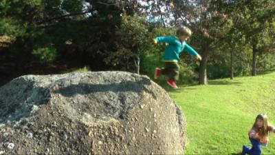 W 3y 9m jumping off rock 2.jpg