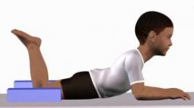 prone forearm support knees flexed block.jpg